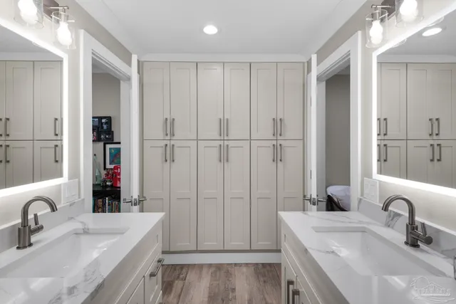 a kitchen with a sink and cabinets