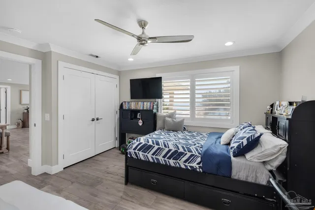 a view of house with yard and green space