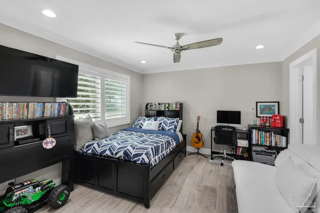 a front view of house with yard and trees