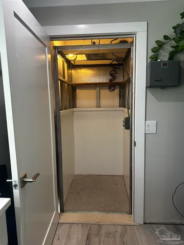 a view of a swimming pool and an outdoor space