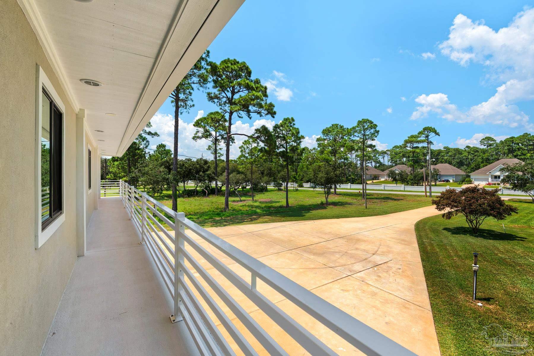 2829 Bay Street Gulf Breeze, FL 32563 - Photo 51 of 69 a view of swimming pool from a balcony