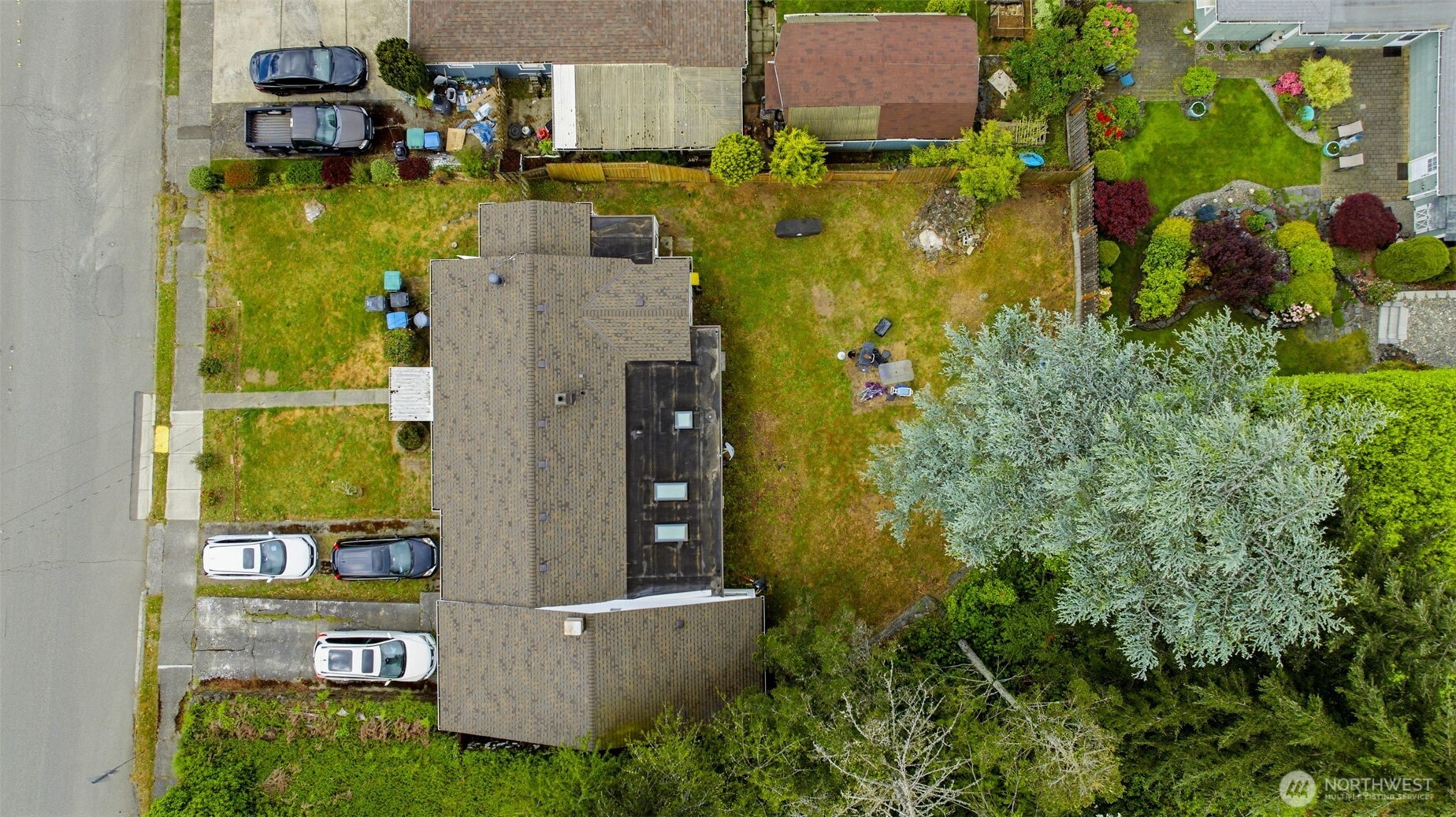 1104 Dibb Street Bremerton, WA 98310 - Photo 13 of 15 an aerial view of residential house with outdoor space and swimming pool