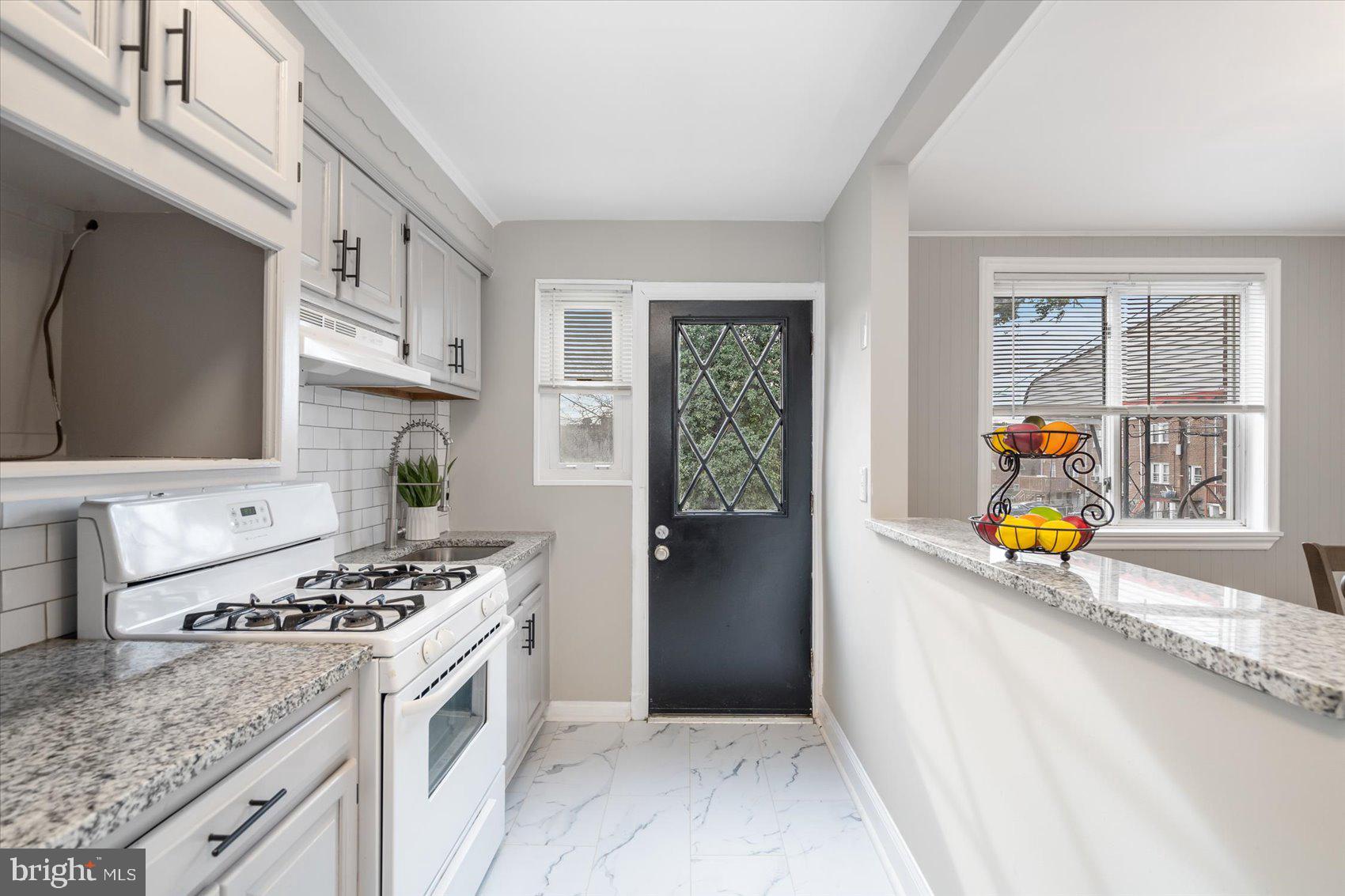 4107 Rokeby Road Baltimore, MD 21229 - Photo 11 of 35 Granite countertops and updated flooring