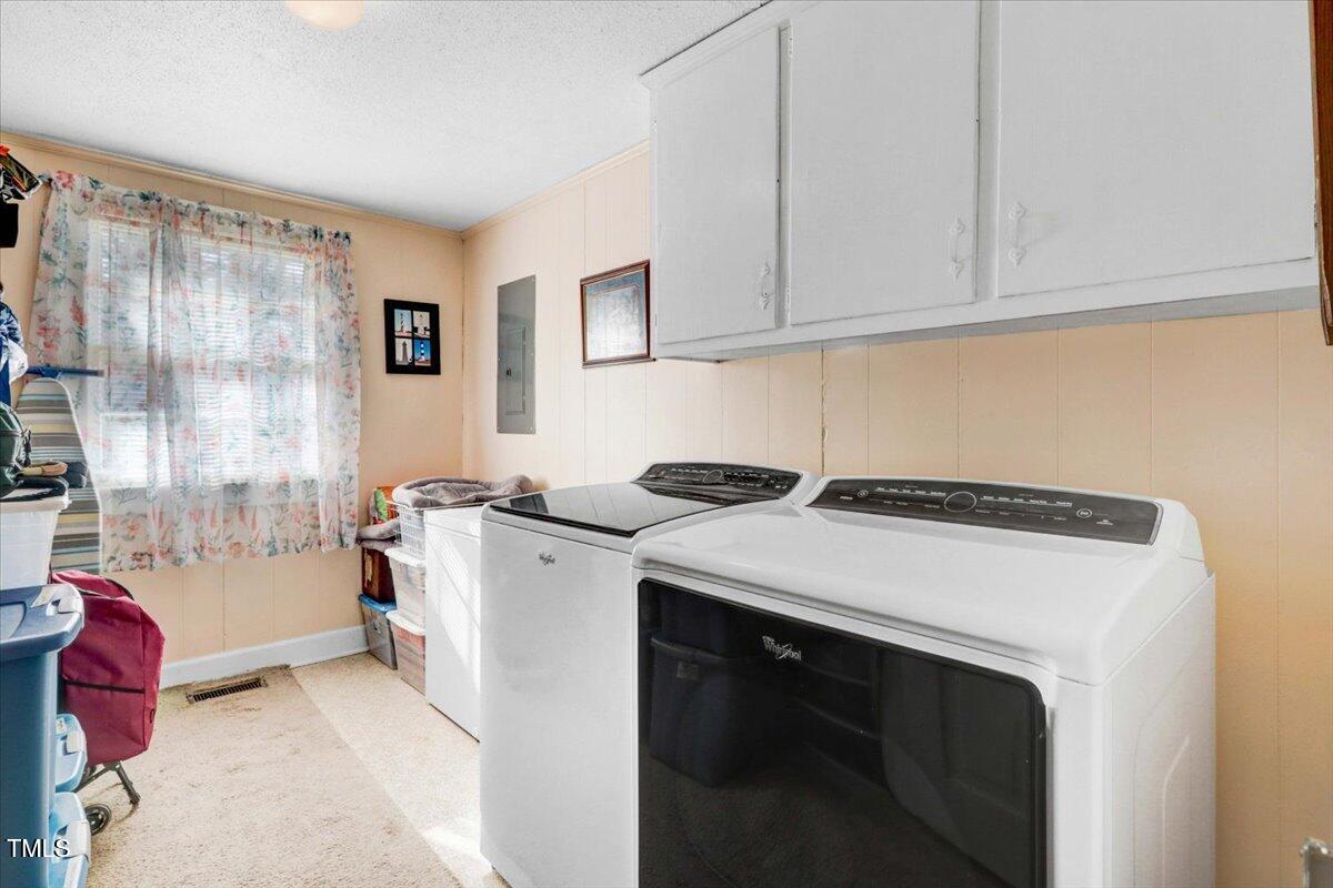 9752 Hawley Road Kenly, NC 27542 - Photo 18 of 46 Laundry Room