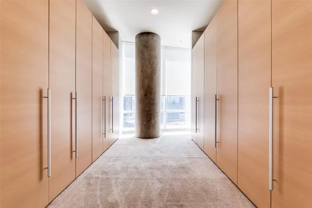 a large white tub sitting in a bathroom