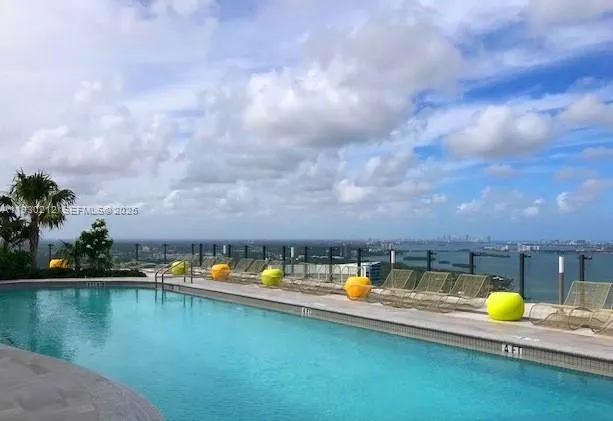 a view of a balcony with an ocean view