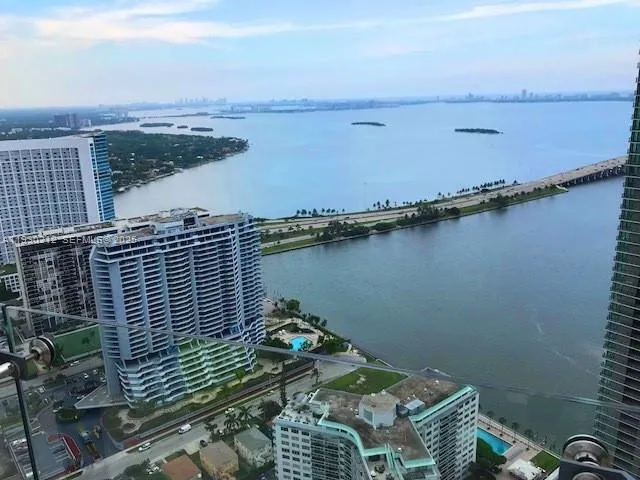 a view of a balcony with an ocean view