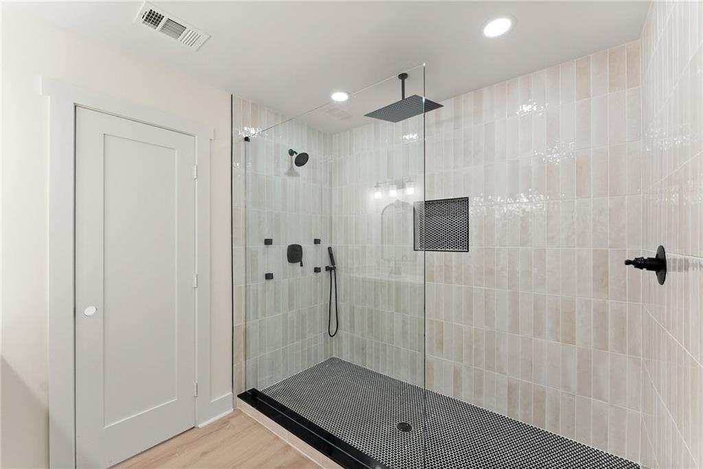 172 Llewellyn Street Clarkesville, GA 30523 - Photo 24 of 44 a bathroom with a shower
