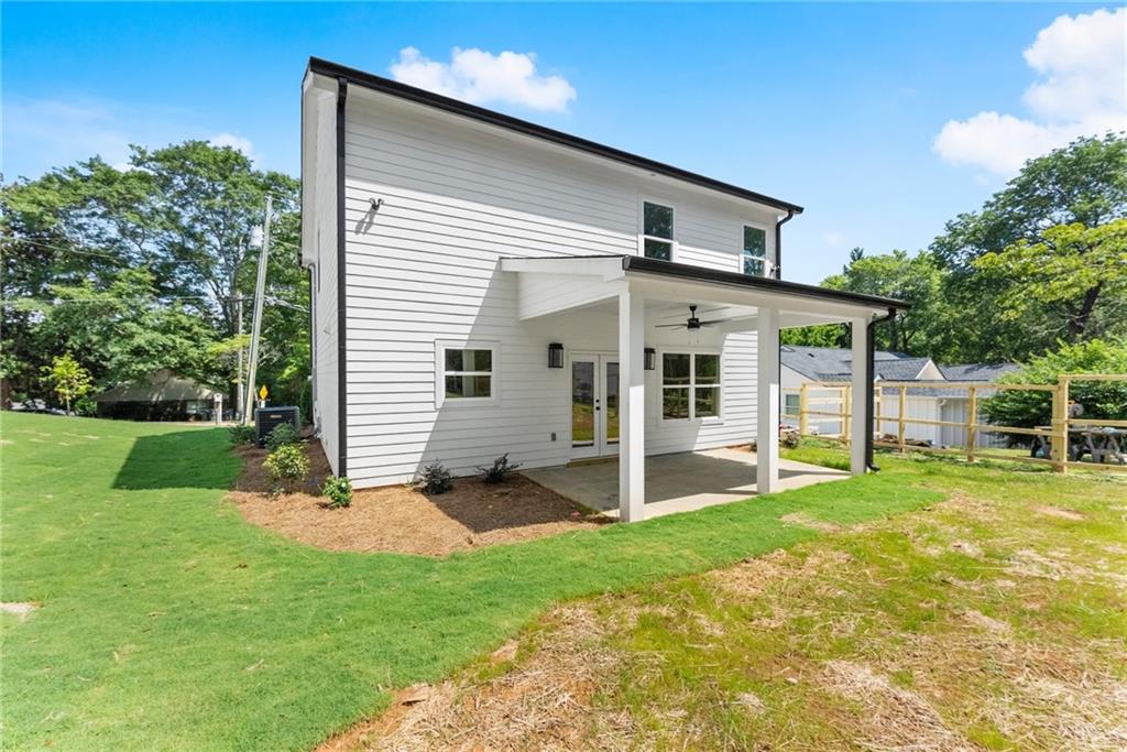 172 Llewellyn Street Clarkesville, GA 30523 - Photo 36 of 44 a view of a house with backyard and garden