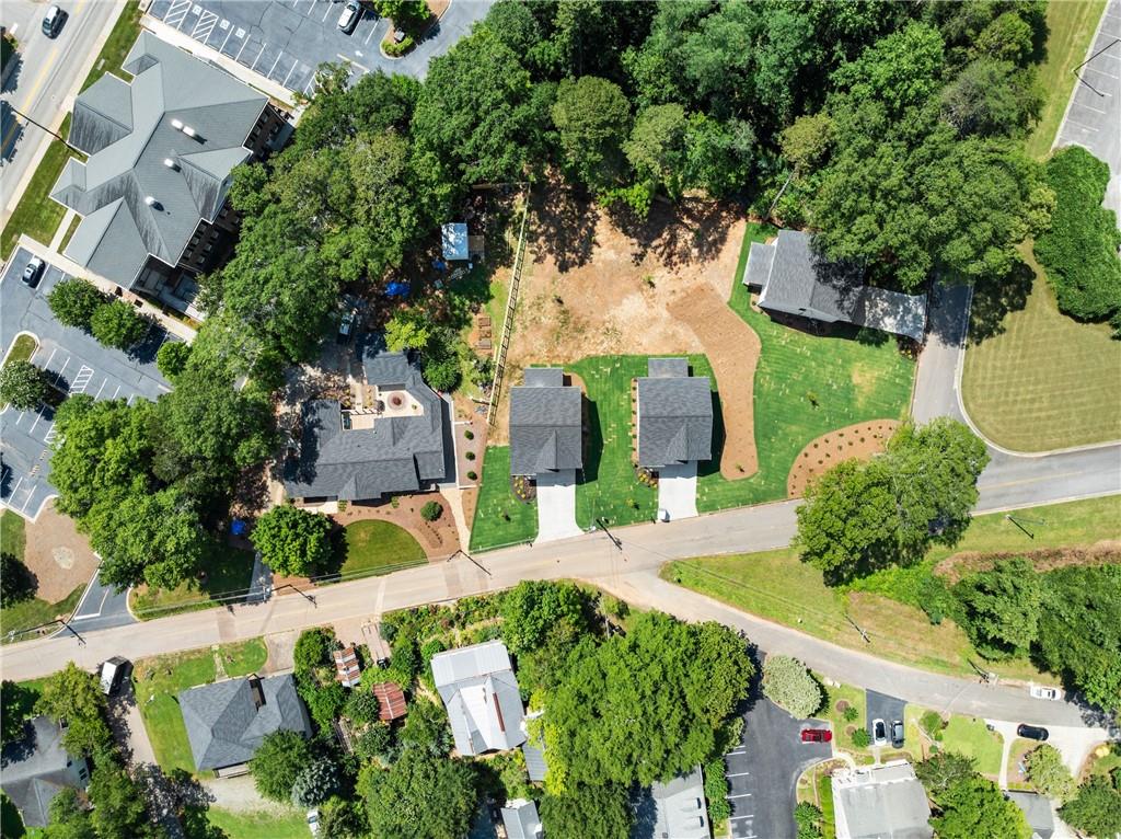 172 Llewellyn Street Clarkesville, GA 30523 - Photo 42 of 49 an aerial view of a house with garden space and street view