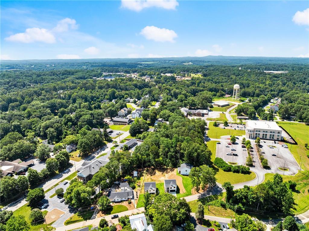 172 Llewellyn Street Clarkesville, GA 30523 - Photo 45 of 49 an aerial view of residential houses with outdoor space and trees