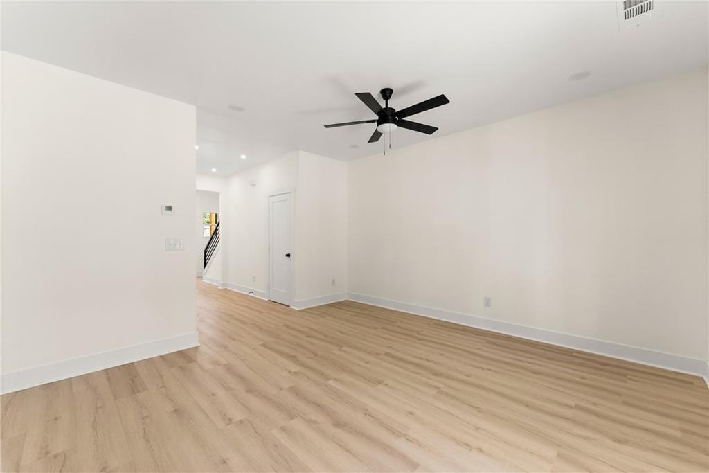 172 Llewellyn Street Clarkesville, GA 30523 - Photo 5 of 44 wooden floor in an empty room
