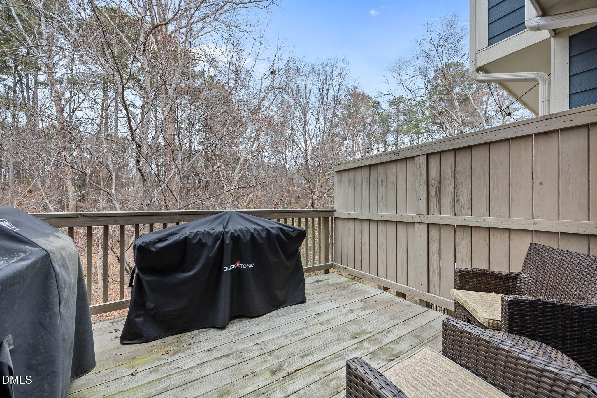 2791 Stone Rock Drive, Unit 113 Raleigh, NC 27604 - Photo 9 of 25 a wooden bench sitting on top of a wooden deck