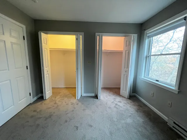 an empty room that has a window