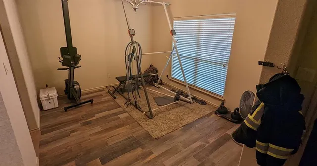 a view of a room with gym equipment