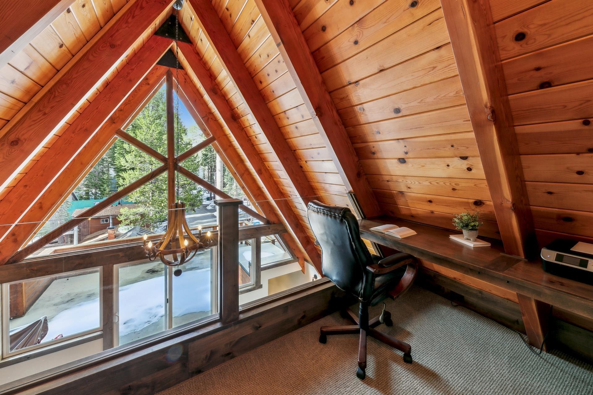 15501 Conifer Drive Truckee, CA 96161 - Photo 14 of 28 a view of an empty room with a window