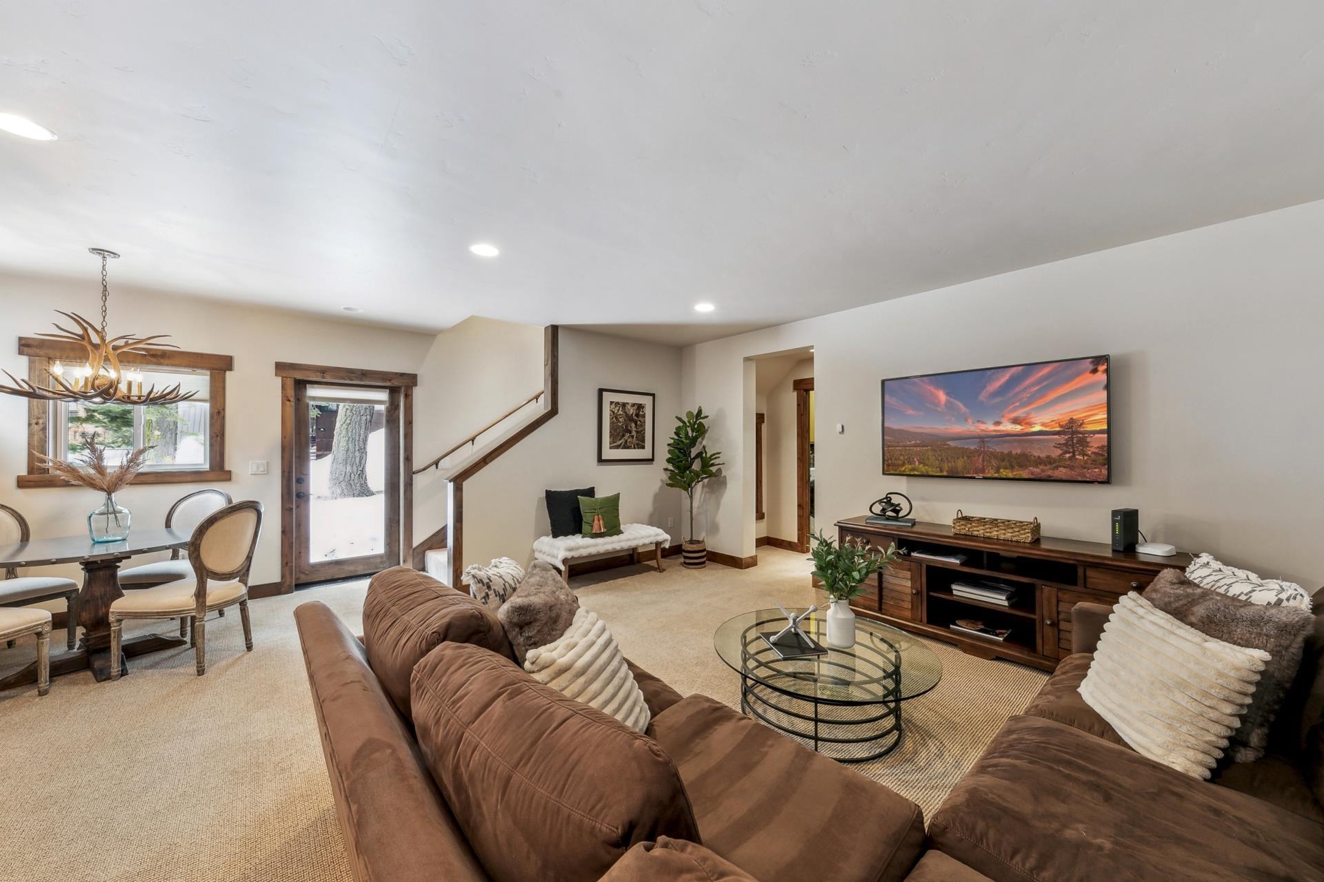 15501 Conifer Drive Truckee, CA 96161 - Photo 16 of 28 a living room with furniture and a flat screen tv