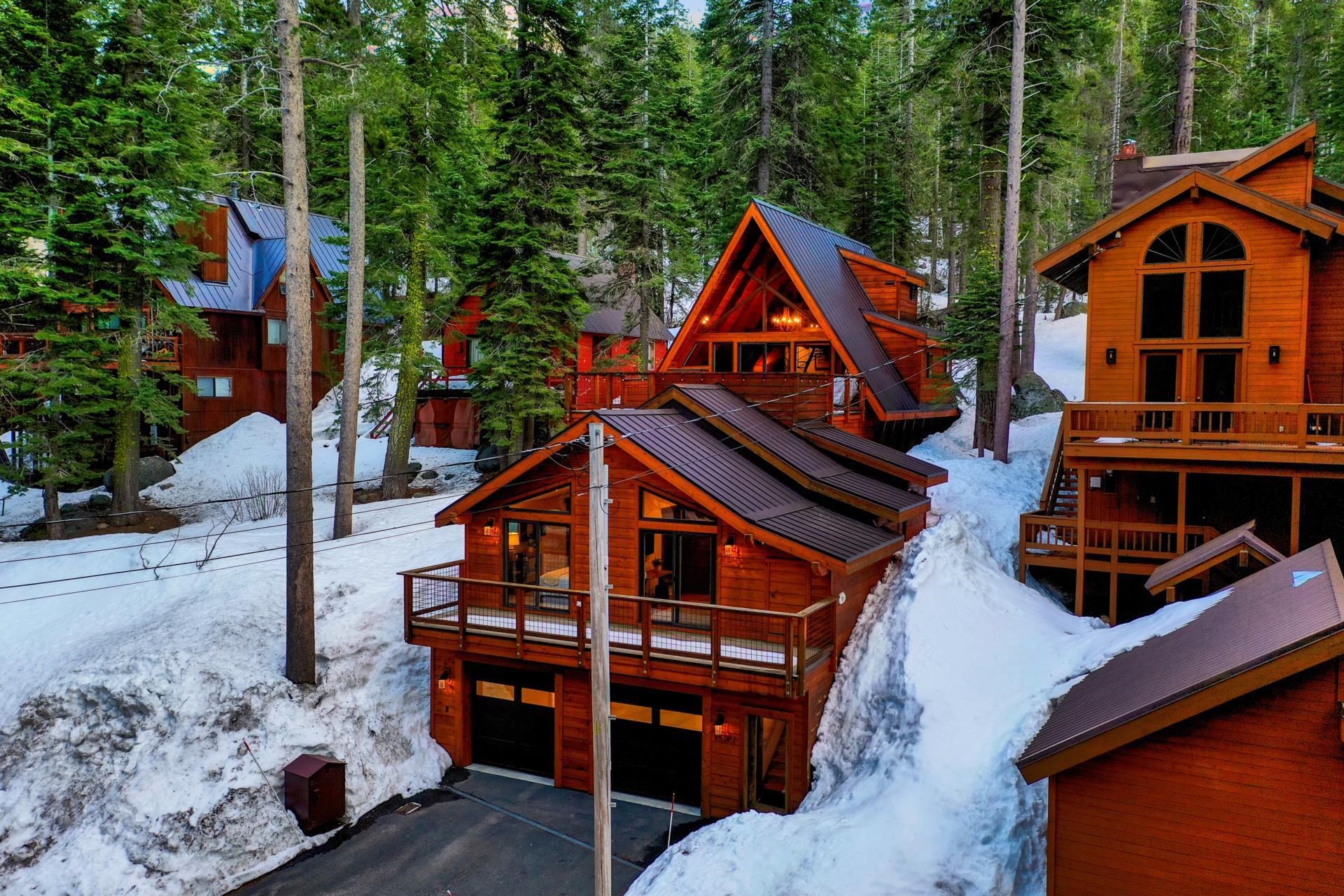 15501 Conifer Drive Truckee, CA 96161 - Photo 2 of 28 a front view of a house with a yard