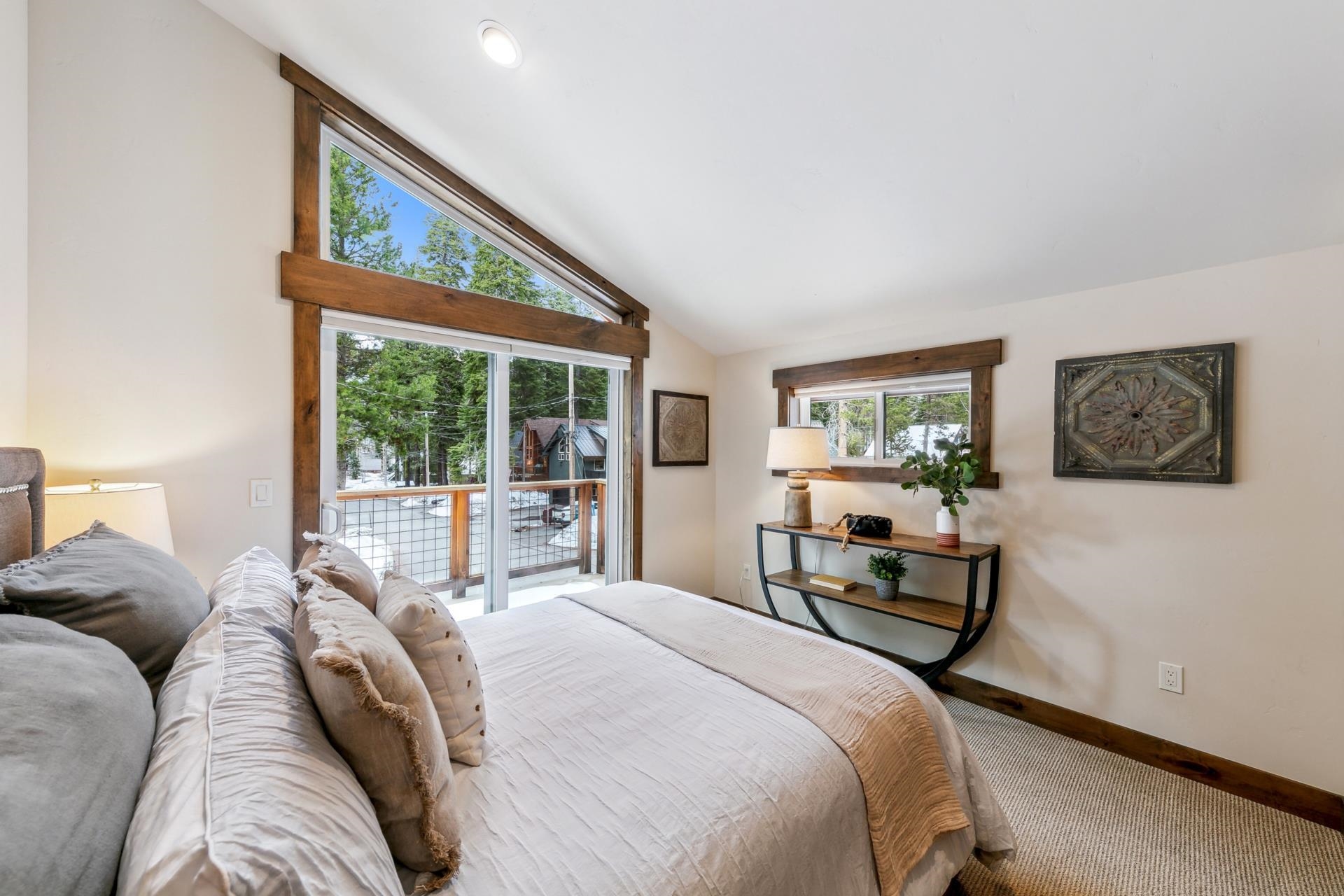 15501 Conifer Drive Truckee, CA 96161 - Photo 23 of 28 a bed sitting in a bedroom next to a window