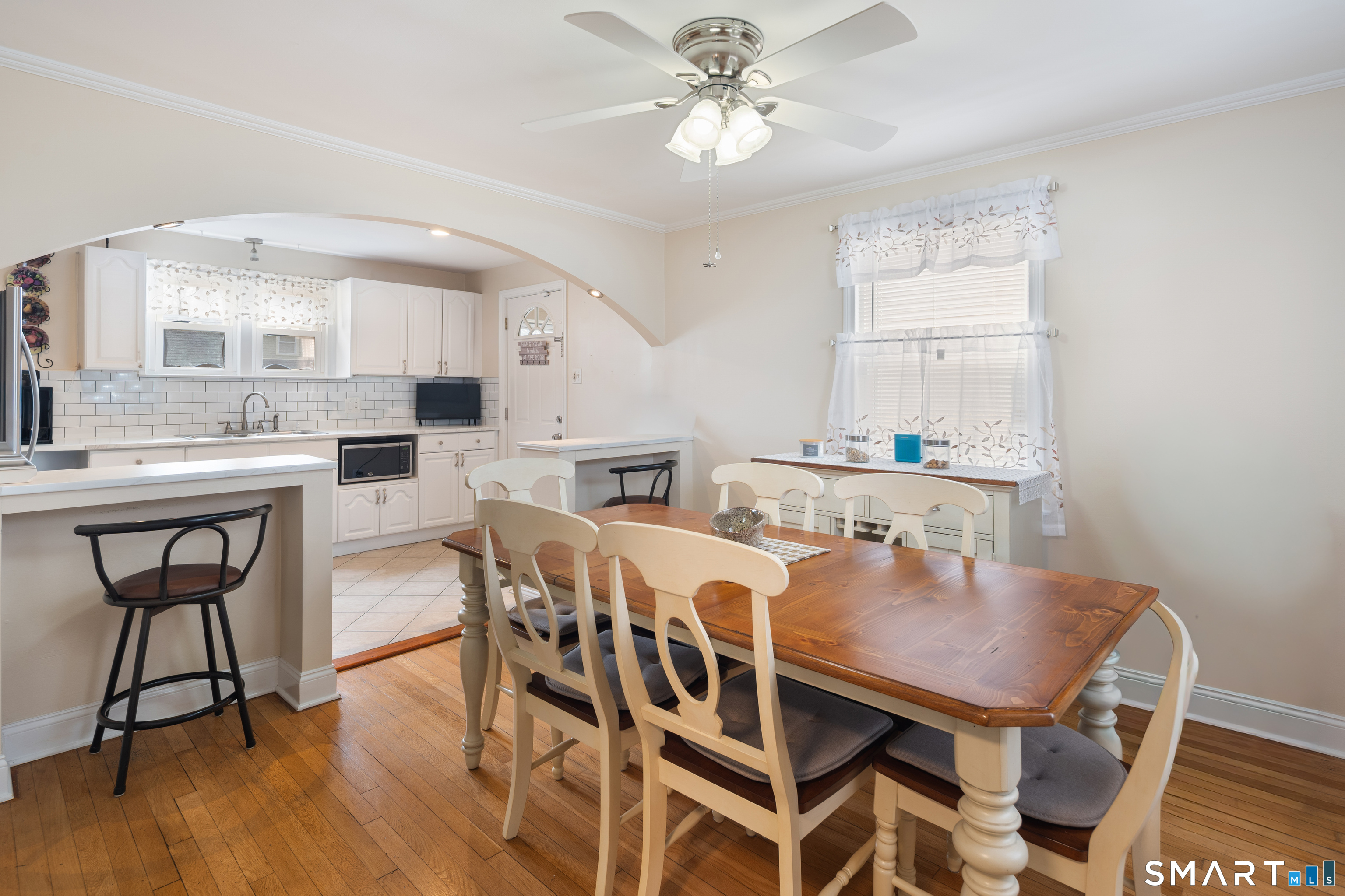 135 Laurel Place Bridgeport, CT 06604 - Photo 20 of 35 a view of a dining room with furniture and wooden floor