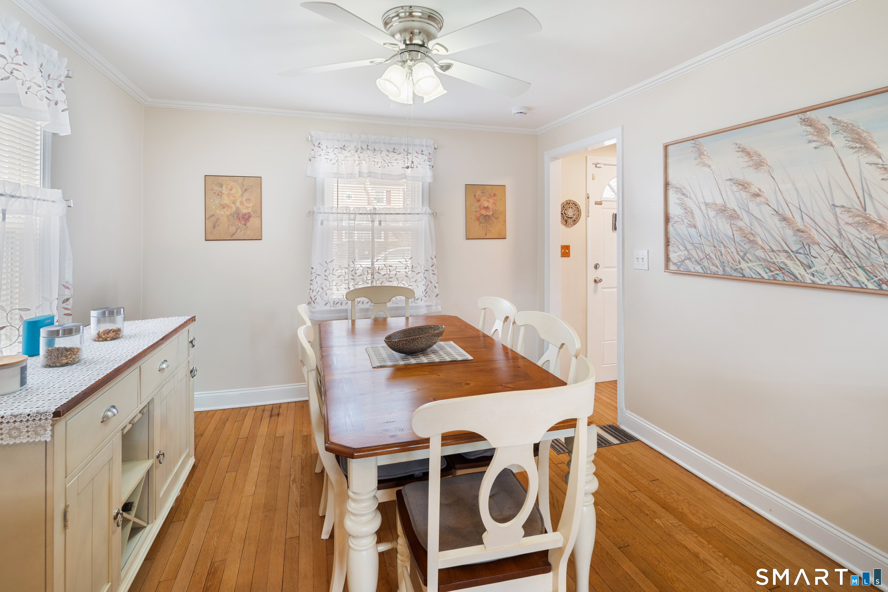135 Laurel Place Bridgeport, CT 06604 - Photo 21 of 35 a view of a dining room with furniture and wooden floor