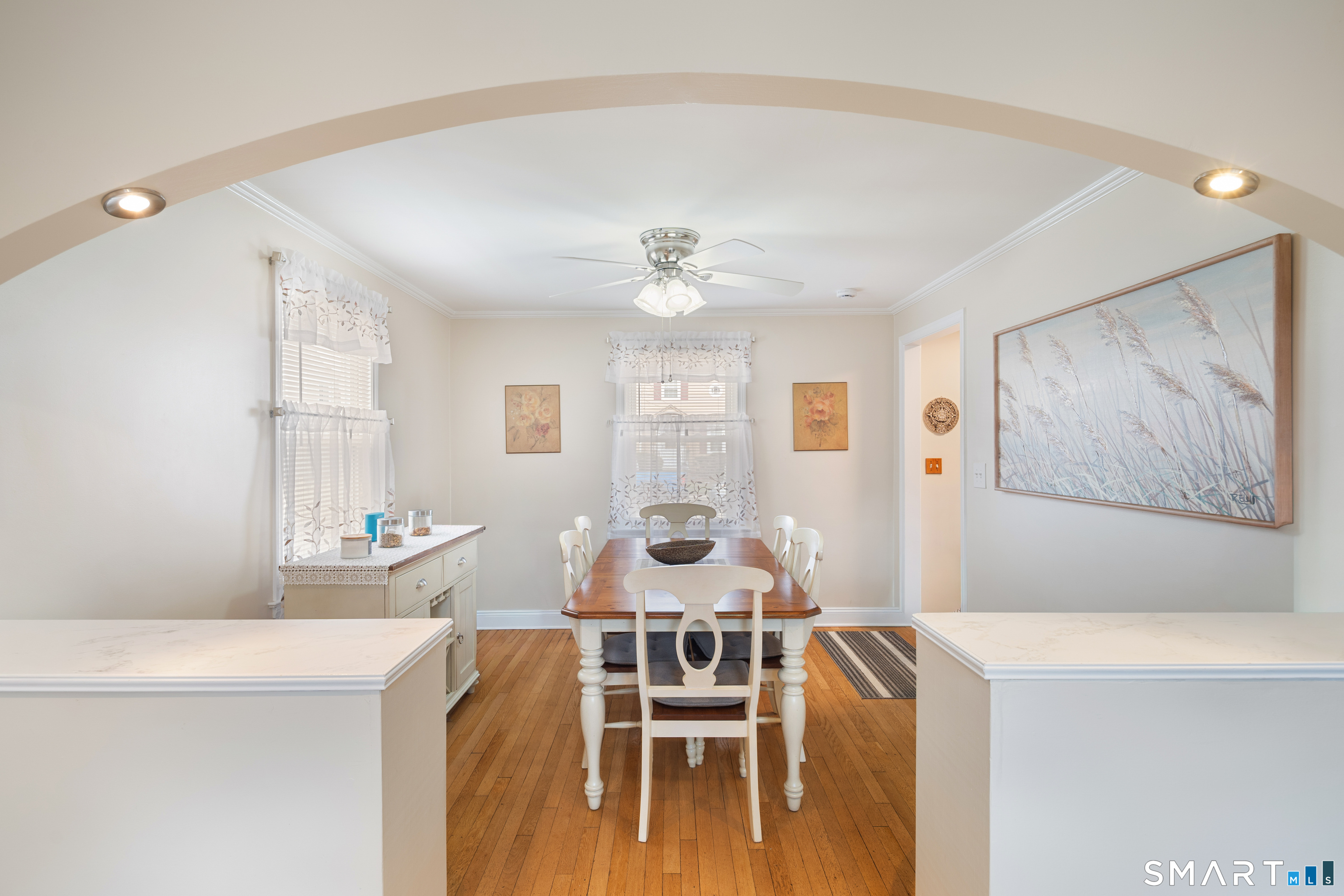 135 Laurel Place Bridgeport, CT 06604 - Photo 23 of 35 a view of a dining room with furniture and wooden floor