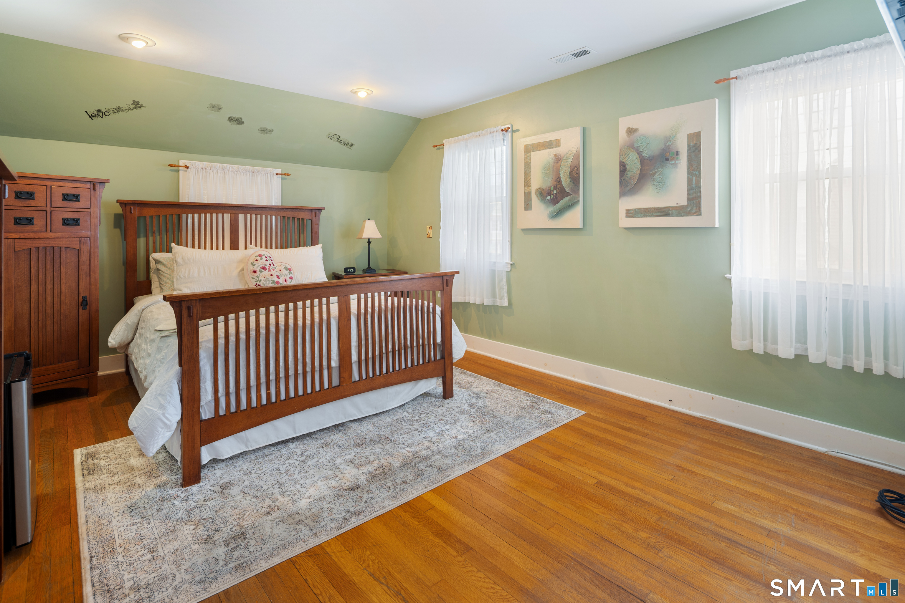 135 Laurel Place Bridgeport, CT 06604 - Photo 26 of 35 a view of a bedroom with wooden floor