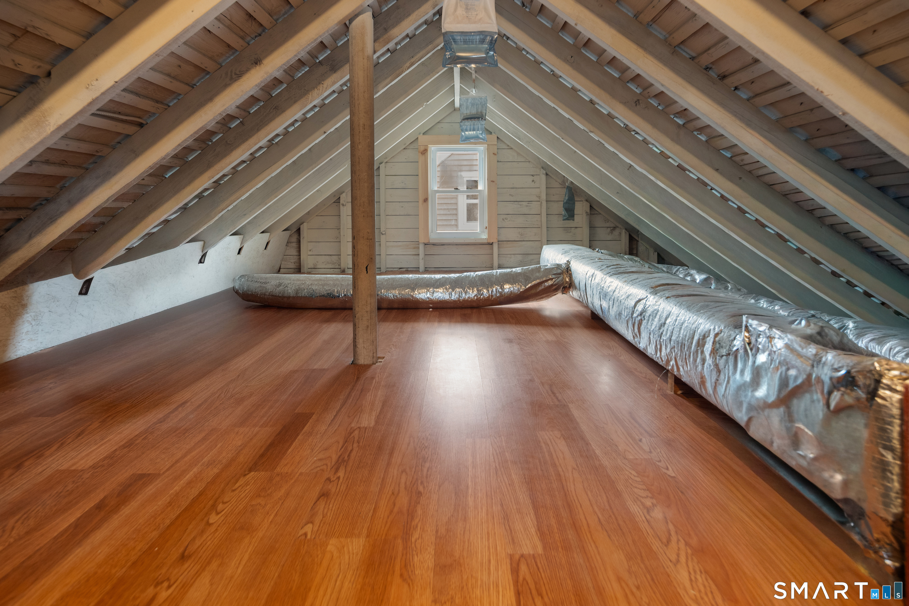 135 Laurel Place Bridgeport, CT 06604 - Photo 32 of 35 a view of a room with wooden floor and stairs