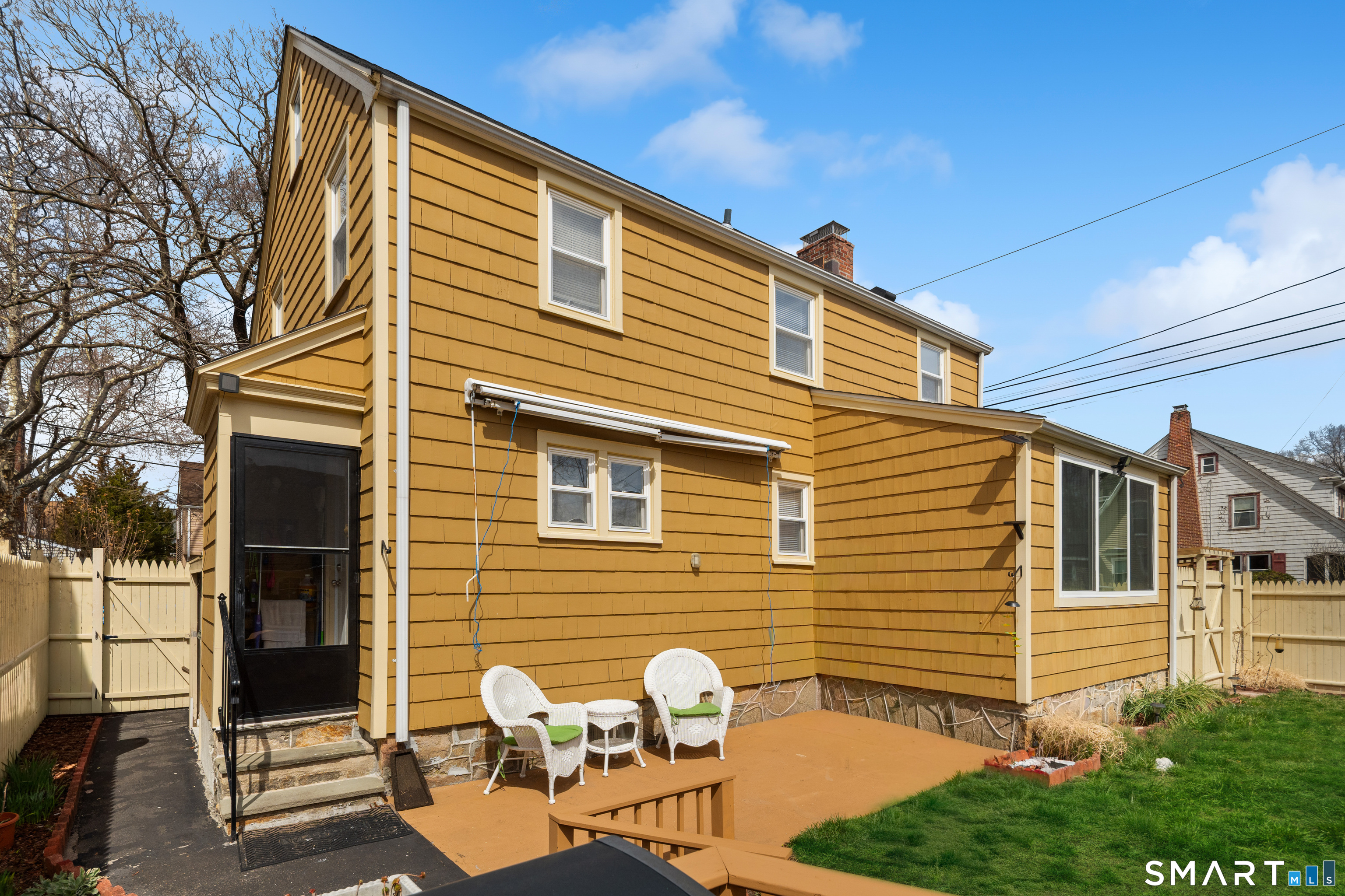 135 Laurel Place Bridgeport, CT 06604 - Photo 6 of 35 a front view of a house with patio