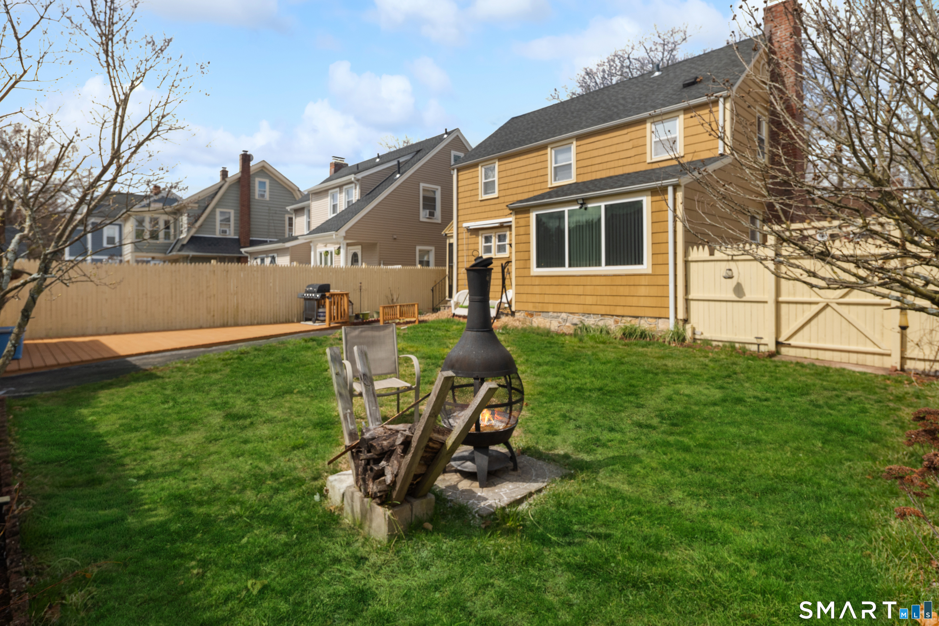 135 Laurel Place Bridgeport, CT 06604 - Photo 8 of 35 a view of a house with backyard