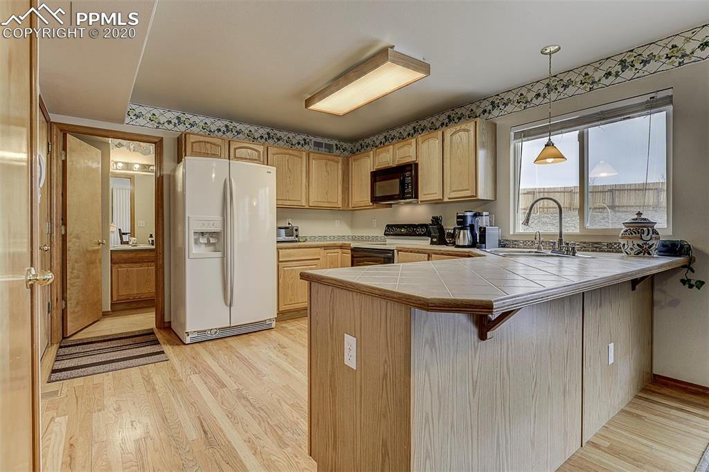3957 Ranch Bluff Court Colorado Springs, CO 80922 - Photo 12 of 31