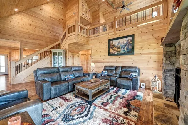 a living room with furniture and a rug