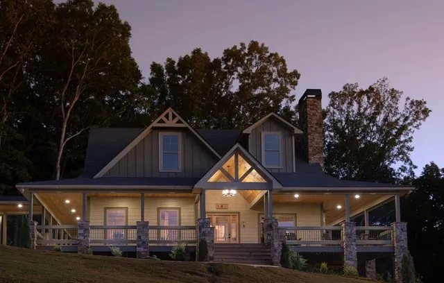 a front view of a house with garden