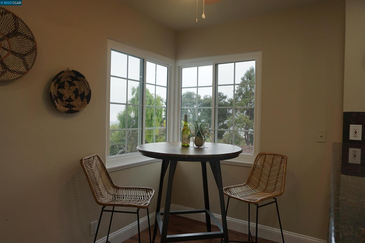 44 Anson Way Kensington, CA 94707 - Photo 12 of 22 a view of a dining room with furniture and window
