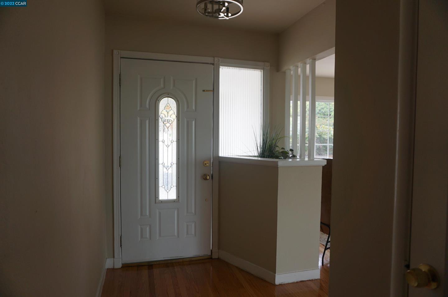 44 Anson Way Kensington, CA 94707 - Photo 3 of 22 a view of an entryway door with a mirror