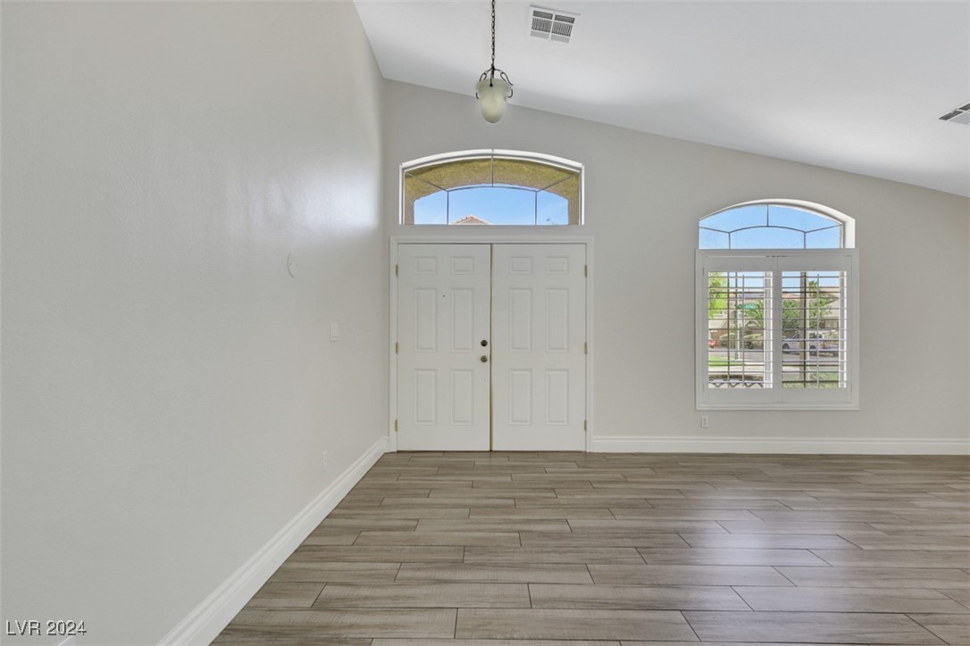 10599 Bonnyhill Street Las Vegas, NV 89141 - Photo 4 of 46 entry with vaulted ceilings