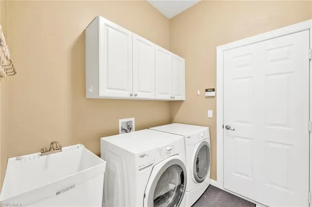 a view of a dining room with furniture and a window