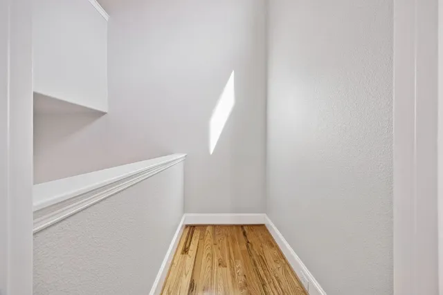 a view of an empty walk in closet