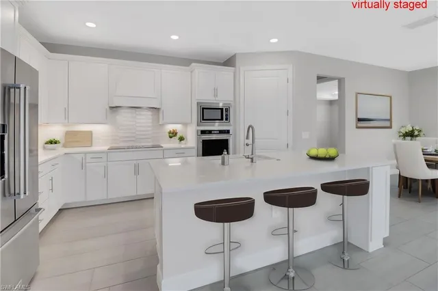 a view of a kitchen with furniture and window