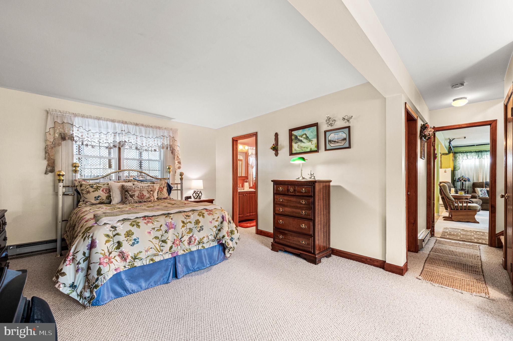 1548 County Line Road Bechtelsville, PA 19505 - Photo 19 of 31 a bedroom with a bed and a view of bedroom