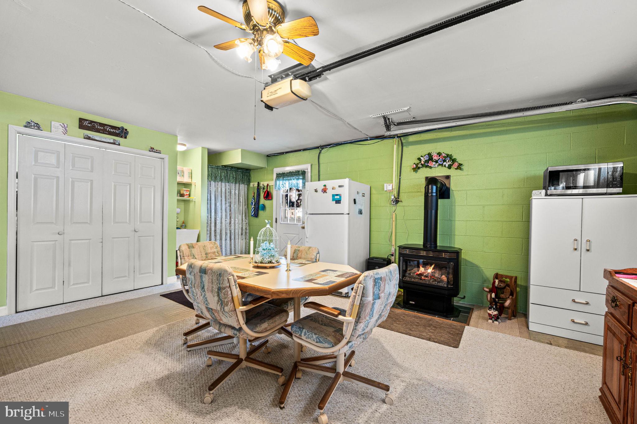 1548 County Line Road Bechtelsville, PA 19505 - Photo 24 of 31 a dining room with furniture and a chandelier