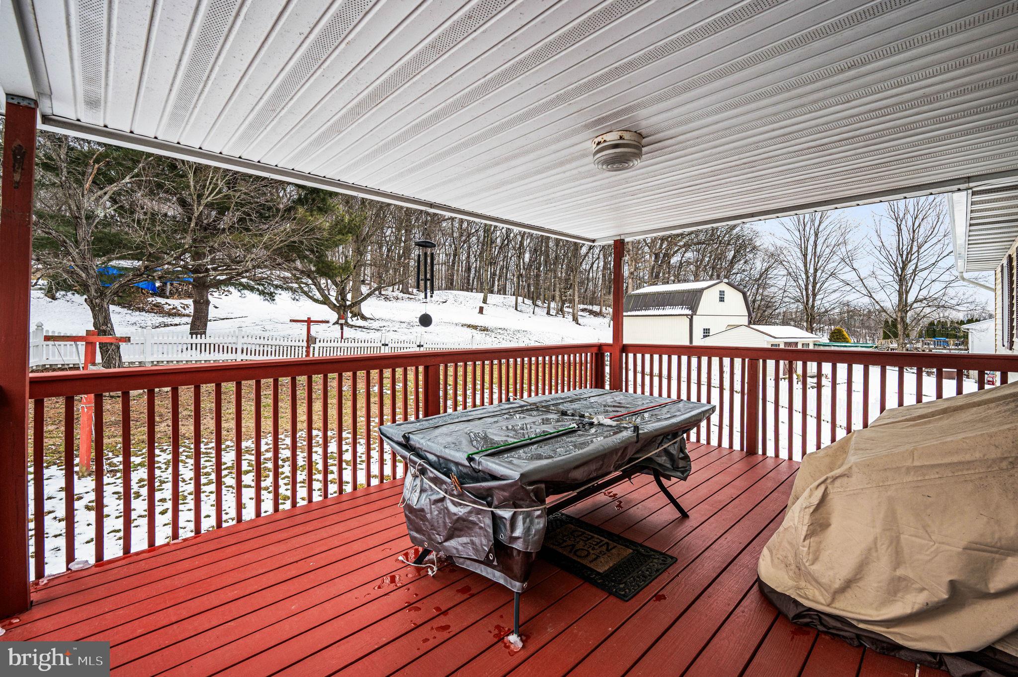 1548 County Line Road Bechtelsville, PA 19505 - Photo 28 of 31 a view of a chairs and table in the patio