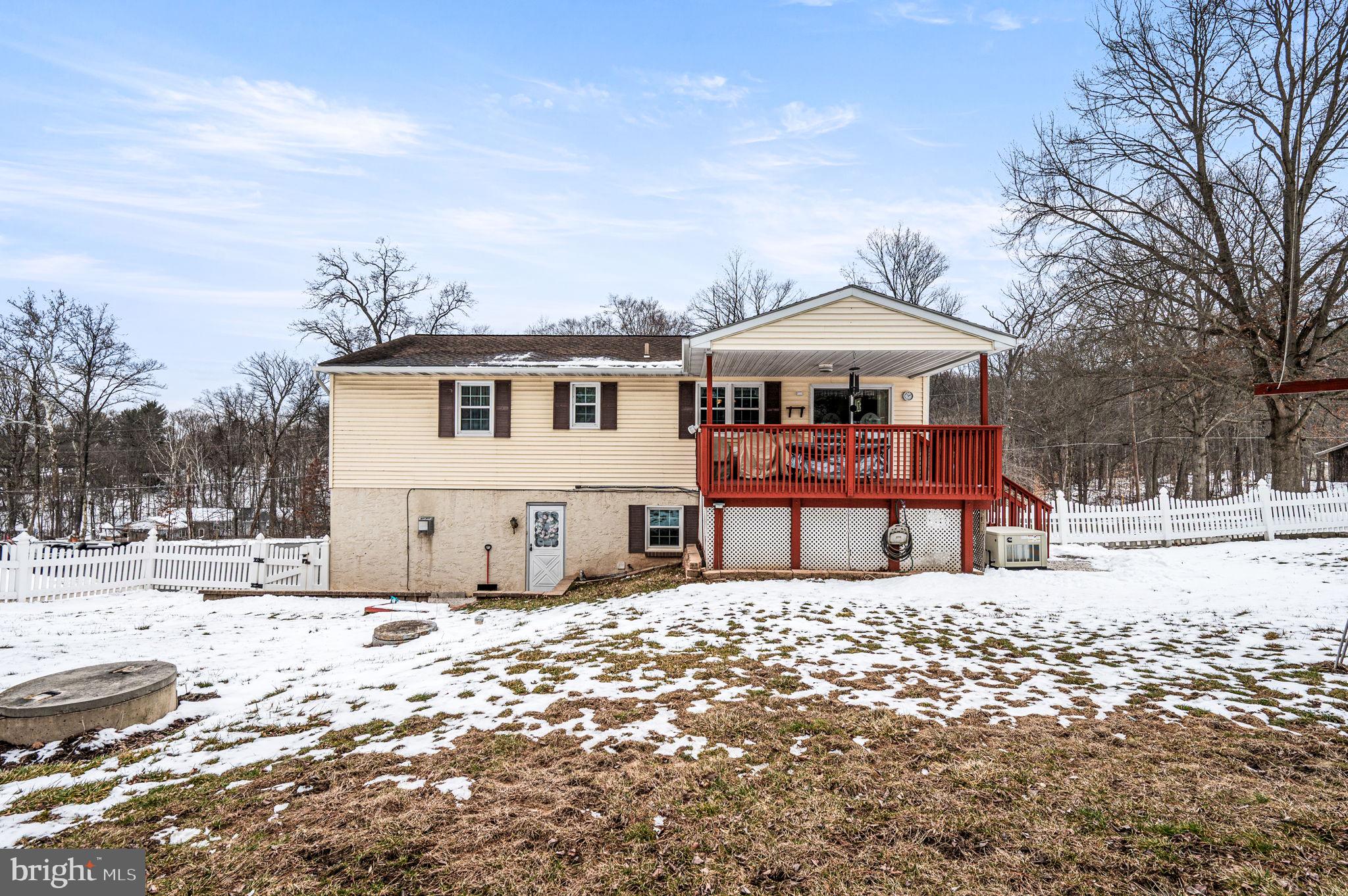 1548 County Line Road Bechtelsville, PA 19505 - Photo 31 of 31 a front view of a house with a yard