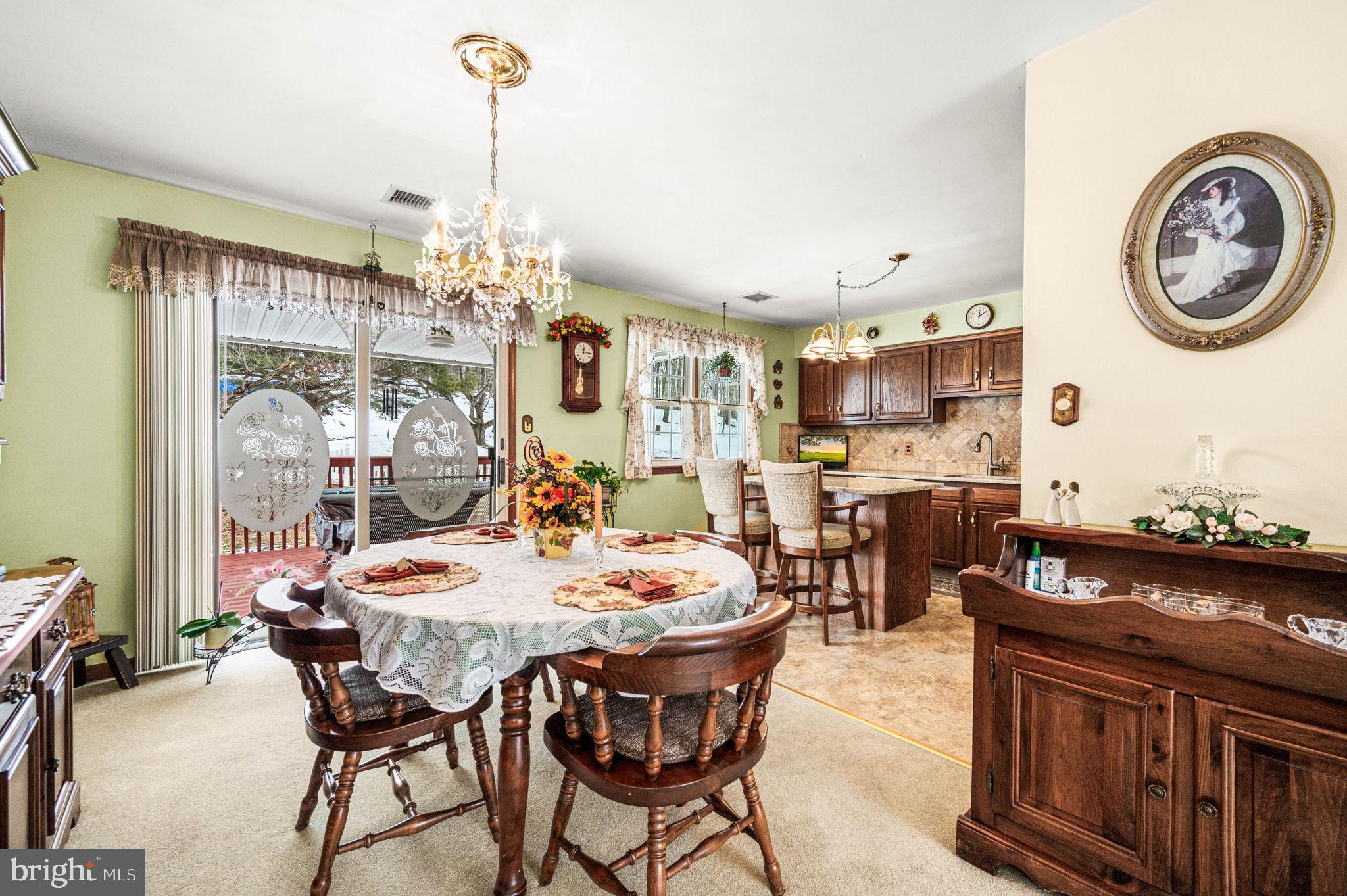 1548 County Line Road Bechtelsville, PA 19505 - Photo 8 of 31 a dining room filled with furniture and window