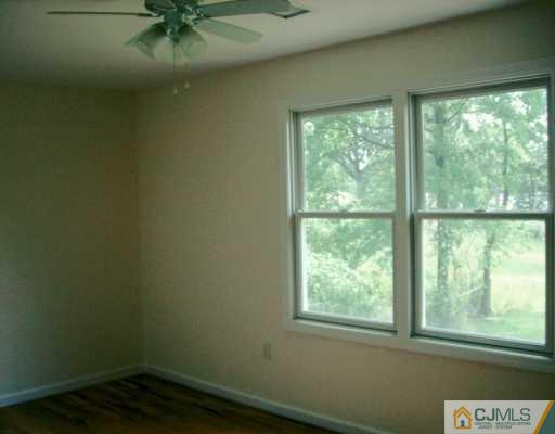 16 Dayton Road Edison, NJ 08817 - Photo 4 of 8 a view of an empty room with a window