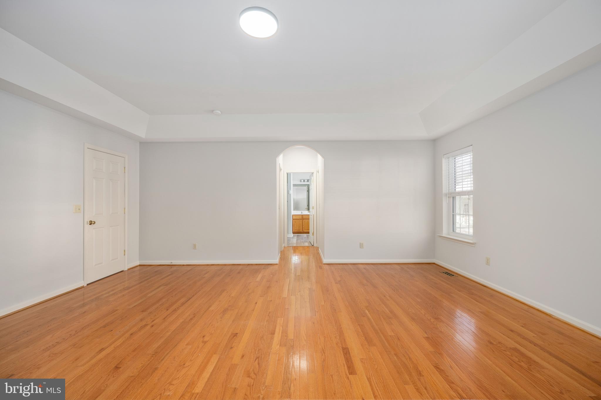 703 Yorktown Boulevard Locust Grove, VA 22508 - Photo 27 of 75 a view of empty room with wooden floor