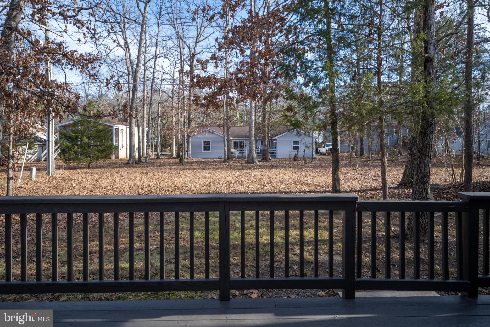 703 Yorktown Boulevard Locust Grove, VA 22508 - Photo 55 of 75 a view of a wooden roof deck