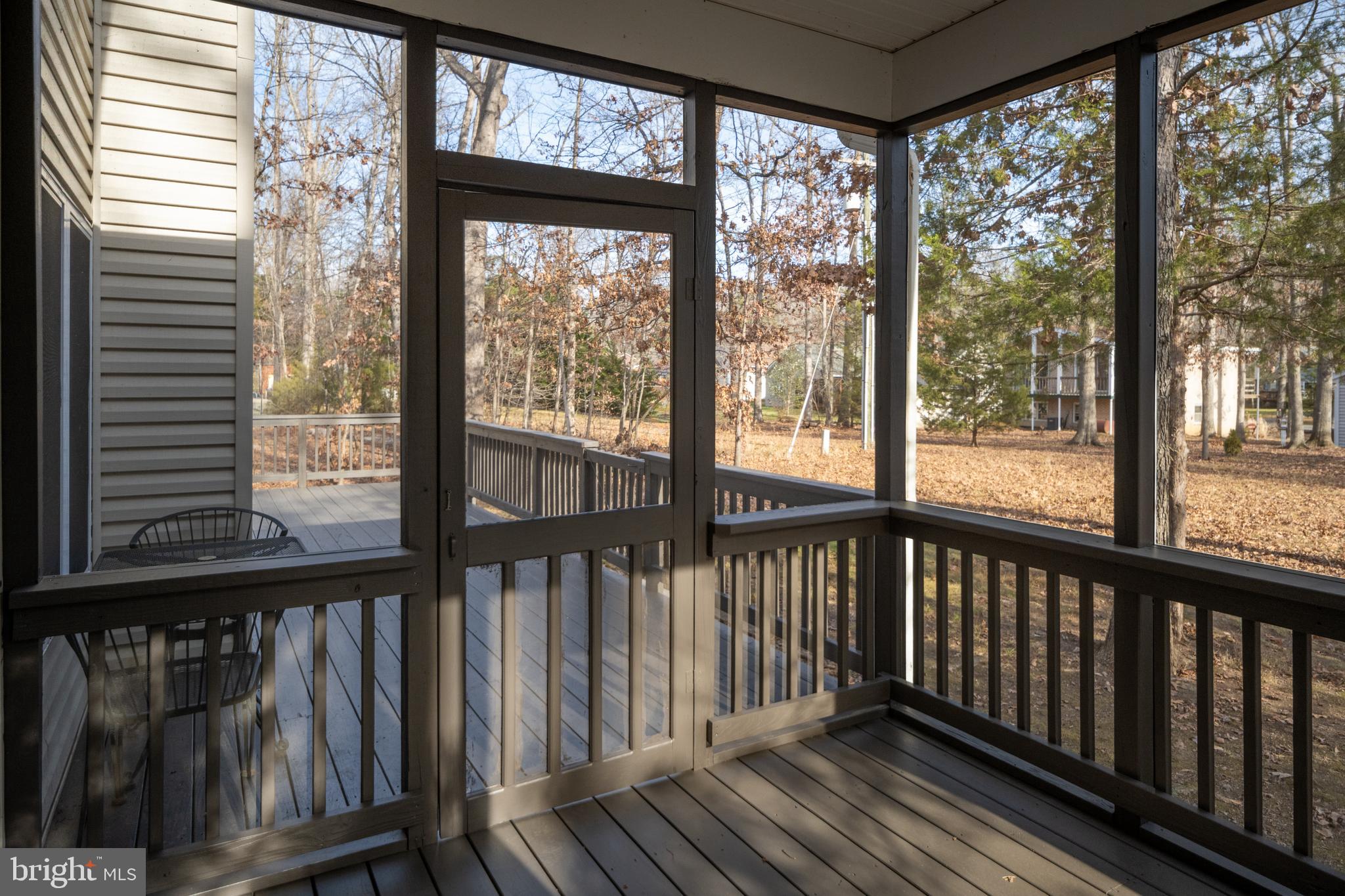 703 Yorktown Boulevard Locust Grove, VA 22508 - Photo 56 of 75 a view of a large window with wooden floor