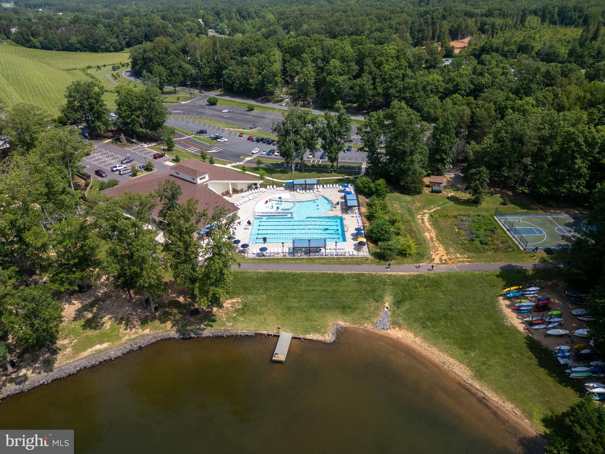 703 Yorktown Boulevard Locust Grove, VA 22508 - Photo 73 of 75 an aerial view of a house with a yard basket ball court and outdoor seating