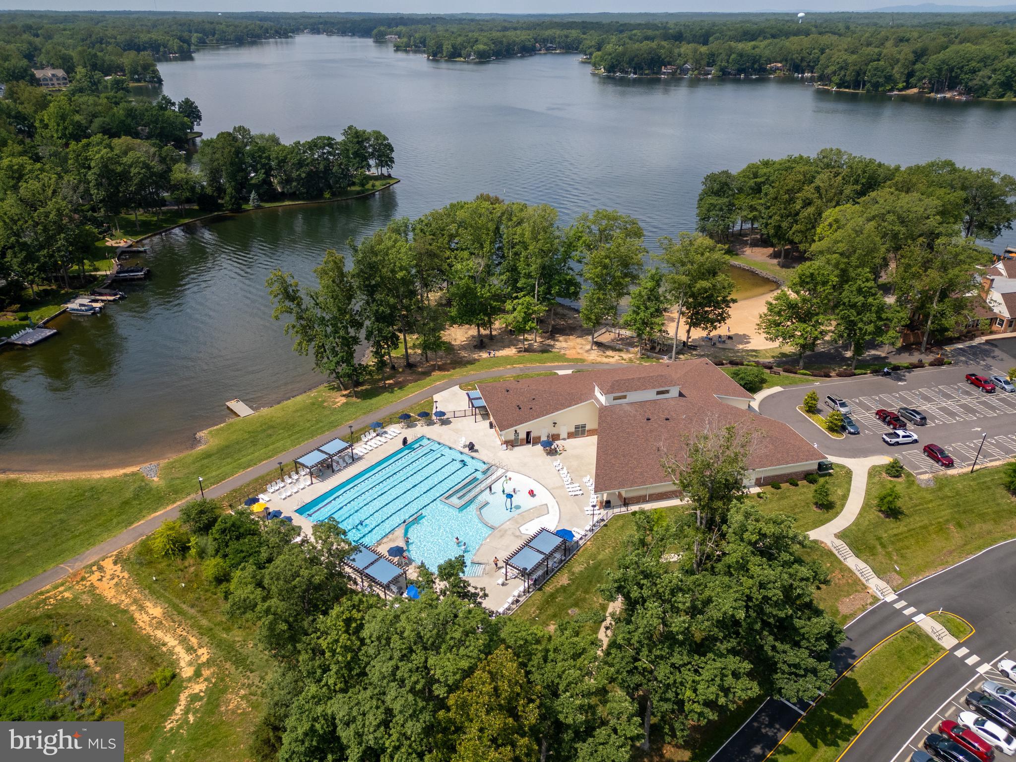 703 Yorktown Boulevard Locust Grove, VA 22508 - Photo 75 of 75 an aerial view of a house with a lake view
